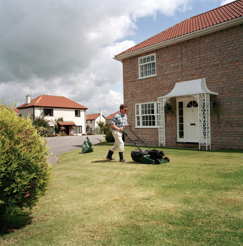 G.B. England. Chew Stoke. Mowing the lawn. 1992.